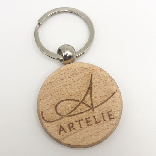 Ronde houten sleutelhanger gepersonaliseerd